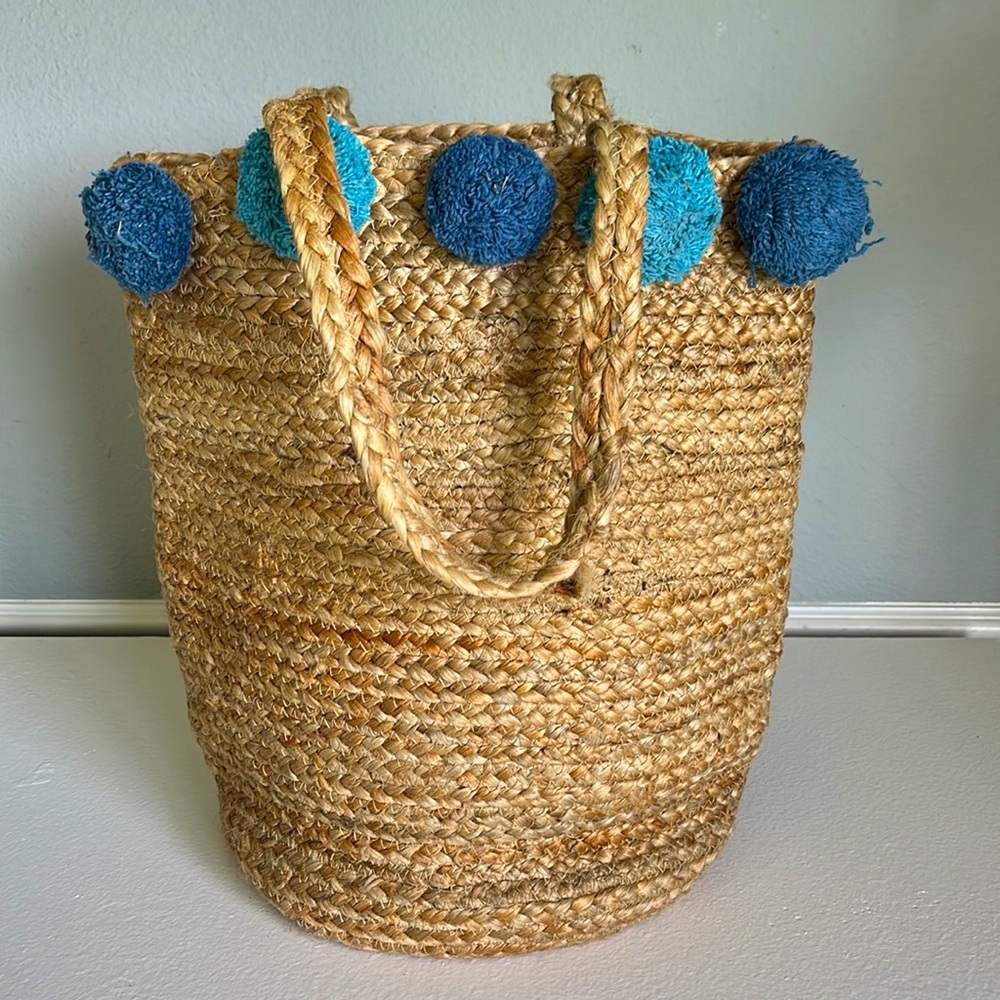 - Anthropologie Jute Braided Tote bag with  Pom Pom
